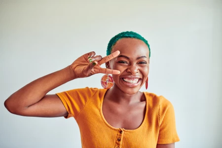 Girl giving peace sign